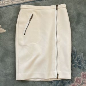 J. Crew cream colored skirt with zippers.